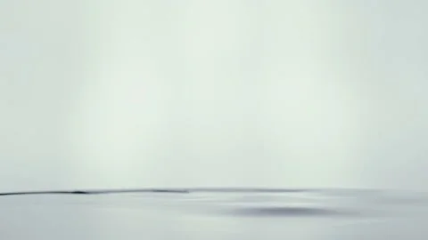 Drop falling into water in slow motion Stock Footage 131867817