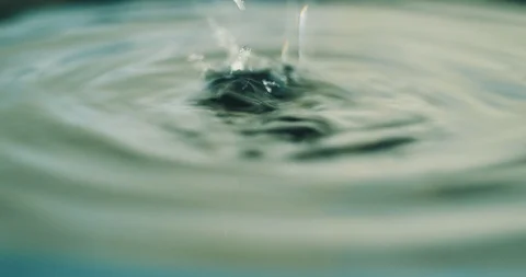 A drop falls on the surface of the water Stock Footage 122397973