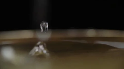 Drop falls into water Stock Footage 147554091