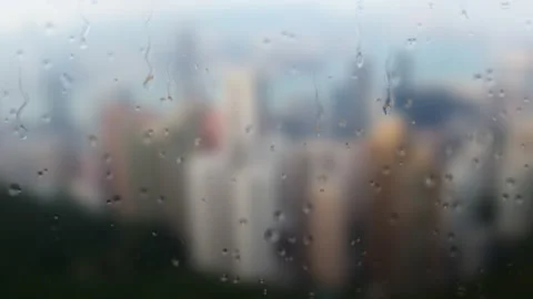 Drop flows down on a window in a rain Stock Footage 137398731