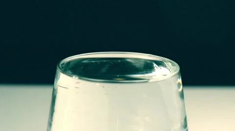 Drop in a glass of water Stock Footage 68374752