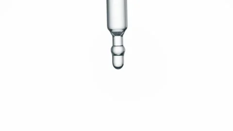 Drop of hyaluronic acid is falling down from pipette Stock Footage 171890858