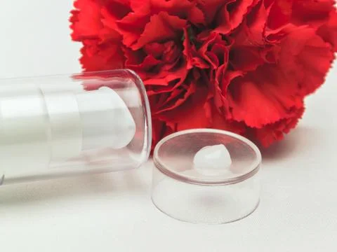 A drop of light cream or face serum, a fresh texture with floral ingredients Stock Photos