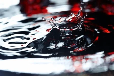 Drop in liquid Stock Photos