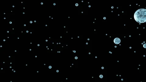 A drop of liquid in zero gravity takes on a perfect round shape. Blue drops fly Stock Footage 129944368