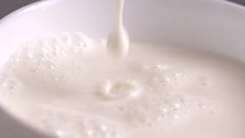 Drop of milk slow motion Stock Footage 123648348