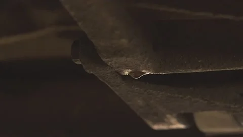 Drop of oil falling under the car 2 Stock Footage 149119451
