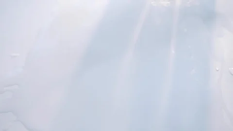 A drop of paint drips onto the paper slow motion Stock Footage 117535765