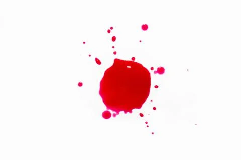 A drop of paint on a white background. Stock Photos