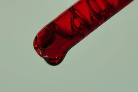 The drop in the pipette of blood. The concept of developing a pharmaceutical Stock-Fotos
