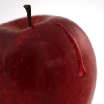 The drop on the red one Stock Photos