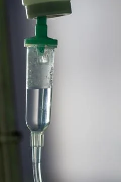 Drop of Saline Solution to Help Patient Stock Photos