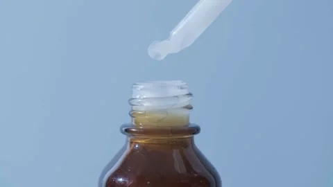 Drop of serum Stock Footage 321844360