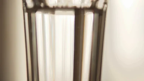 Drop soluble tablets in a glass. The formation of effervescent air bubbles from Stock Footage 114020675