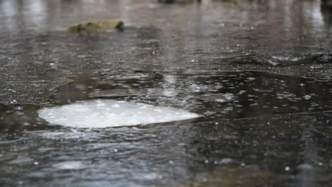 Drop stone ice splash water river slow motion closeup. Destruction rock explode. Stock Footage 133012739