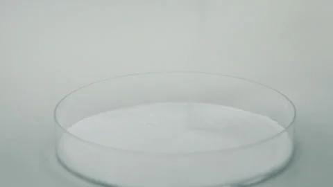 Drop sugar to the glass container  extra close up slow motion Video stock 159122136