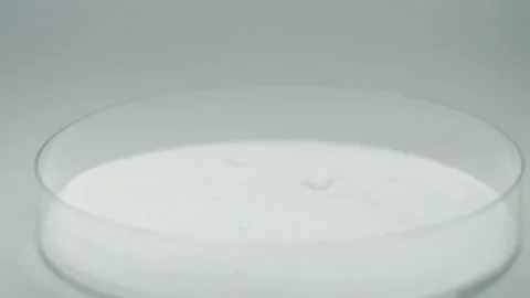 Drop sugar to the glass container high angle extra close up slow motion Vídeos de archivo 159146695