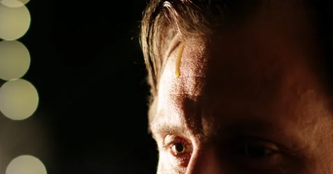 A drop of sweat is coming down on man's forehead. Stock Footage 68790705