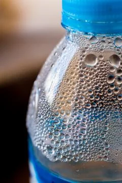 Drop of water on bottle Stock Photos