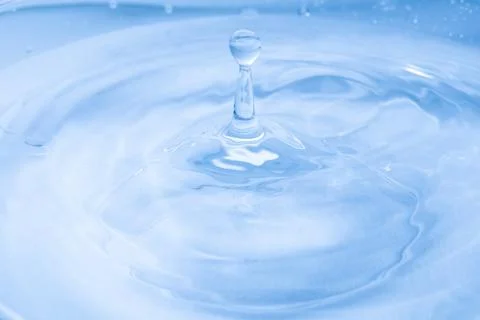 Drop of water. Colored drops background. Fotos Stock