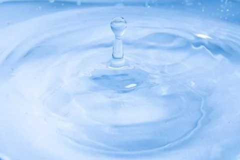 Drop of water. Colored drops background. Fotos Stock