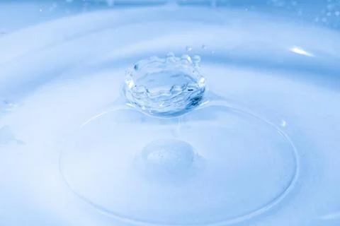 Drop of water. Colored drops background. Fotos Stock