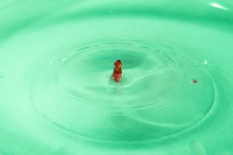 Drop of water. Colored drops background. Fotos Stock