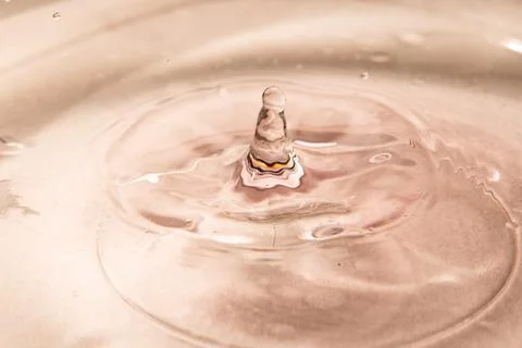 Drop of water. Colored drops background. Fotos Stock