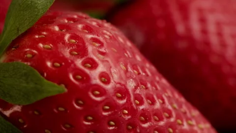 Drop of water falling on strawberry in slow motion Stock Footage 156202002