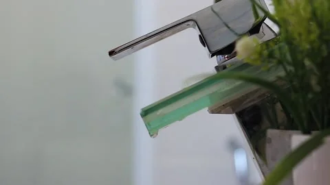 Drop of water falling from the tap Stock Footage 134979059