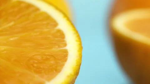 A drop of water falls on a  orange blue background Super slow-mo 1000 fps Stock Footage 276732089