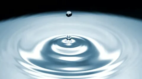 Drop of water falls in slow motion - dark surface - 01 - High Speed 1050fps Stock-Footage 11611886
