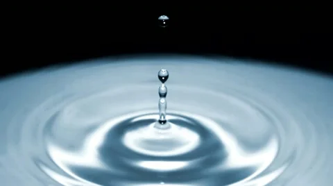 Drop of water falls in slow motion - dark surface - 04 - High Speed 1050fps Stock-Footage 11611895