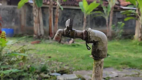 A drop of water on the faucet Video stock 210993178