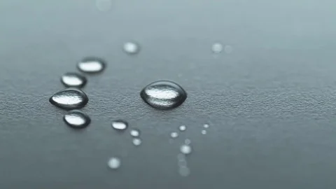 Drop of Water hits black Surface 04 Video stock 84075433