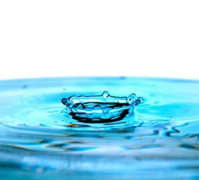 Drop on water Stock Photos