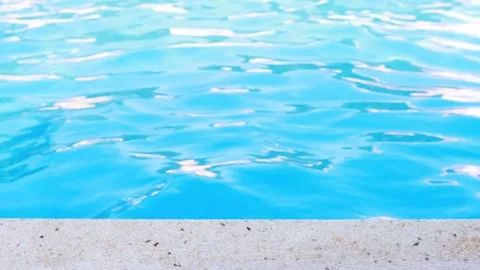 A drop of water in the pool. Blue color. Summer sea wave texture. Crystal wet Stock Footage 261983073