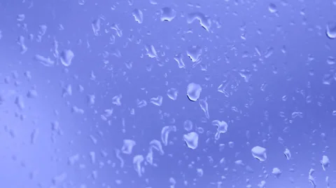 Drop of water runs down the glass surface with condensate Stock Footage 30459924