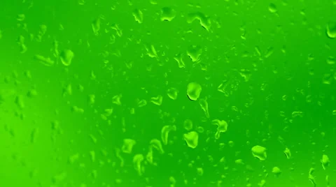 Drop of water runs down the glass surface with condensate Stock Footage 30459927