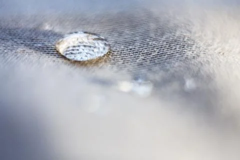 A drop of water on the surface of the tissue. Macro view. select Stock Photos