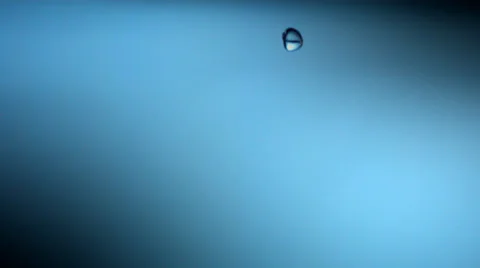 Drop of water on water surface, close-up. Stock Footage 51841552