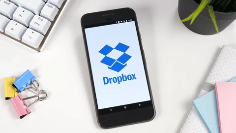 Dropbox Cloud Storage Logo Sowing on a Smartphone Screen Stock Footage 88682169