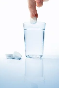Droped Aspirin Foto stock