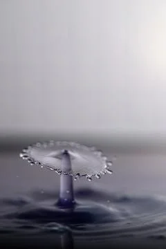 Droplet collision Stock Photos
