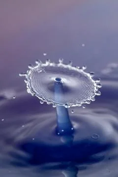 Droplet collision Stock Photos