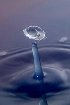 Droplet collision Stock Photos