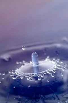 Droplet collision Stock Photos