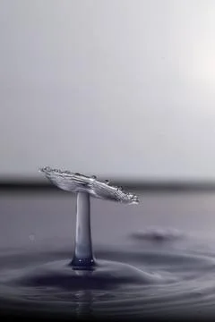 Droplet collision Stock Photos