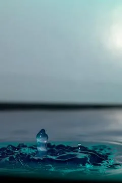 Droplet collision Stock Photos