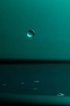 Droplet collision Stock Photos